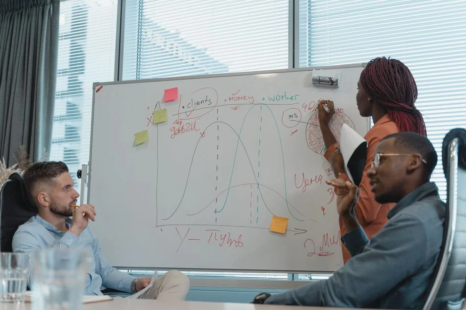 A top view on charts and smartphone in an office, showcasing data analytics.